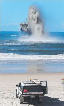  ?? Picture: GLENN HAMPSON ?? Noise from the sand-pumping barge may make it hard for whales to hear shark net warning pings.