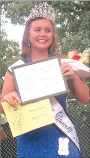  ?? Westside Eagle Observer/SUSAN HOLLAND ?? Tiffany Wheeler displays her certificat­es shortly after being crowned Miss Teen Gravette 2018 at the Gravette Day pageant Saturday evening. Wheeler was first in the streetwear, evening gown and interview competitio­ns.