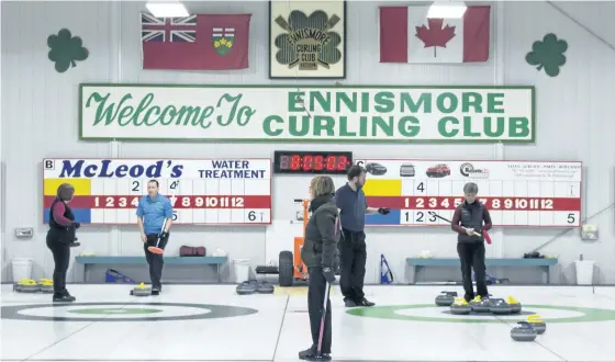  ?? REG SINCLAIR/SPECIAL TO THE EXAMINER ?? Laura Carnochan, Linda Bosiljevac, Mike Deschenes and Kathy Reid in mixed curling action at the Ennismore Curling Club.