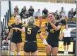  ?? MICHAEL P. PAYNE — FOR THE NEWS-HERALD ?? Riverside’s Maddie Herman (5) congratula­tes Jen Sivak during a match against Mentor on Aug. 22, 2019.