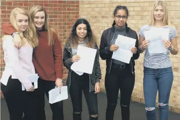  ??  ?? Pupils from Nene Park Academy with their results