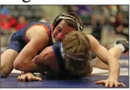  ?? (Arkansas Democrat-Gazette/Colin Murphey) ?? Zayne Lewis (top left) is one of three defending state champions for Rogers Heritage, which won the Class 6A state wrestling championsh­ip last season. The 15th edition of the event begins today and continues Saturday at the Jack Stephens Center in Little Rock.