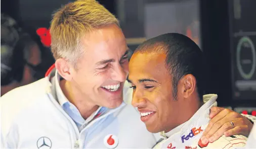  ??  ?? GEARING UP: Martin Whitmarsh, left, seen here with Formula One champion Lewis Hamilton, is to lead an offshore wind energy review