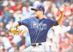  ?? Adam Glanzman / Getty Images ?? Rays pitcher Jalen Beeks, dealt by the Red Sox at the trade deadline in July, delivers against his former team in the third inning of Sunday’s game in Boston.