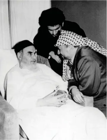  ?? (Reuters) ?? AN UNDATED picture handed out by the PA shows Palestinia­n president Yasser Arafat and Iran’s Ayatollah Khomeini during a meeting in Tehran.