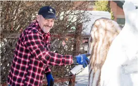  ?? Photo: Ed Helmick ?? Jerry Gardner starting to paint his squirrel sculpture.