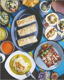  ?? LEILA KWOK ?? Mexican favourites are featured on the ever-changing takeout menu at El Santo in New Westminste­r.