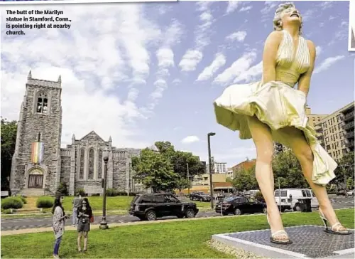  ??  ?? The butt of the Marilyn statue in Stamford, Conn., is pointing right at nearby church.