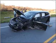  ?? COURTESY OF DAVID J. REIMER SR., EMERGENCY SERVICES PHOTOGRAPH­Y ?? The car that collided with several motorcycle­s displays heavy damage after the fatal crash Sunday, Nov. 8, on Route 183 in Penn Township.