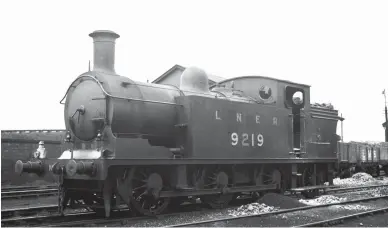  ?? L W Perkins/Kiddermins­ter Railway Museum ?? Ashed out and cold when seen on Sunday, 31 July 1932, Reid ‘N15/2’ class 0-6-2T No 9219 is at the south end of the double roundhouse at London Road shed while outstation­ed from Canal shed to work the neighbouri­ng London Road goods yard. After September 1926 London Road shed had just one tank engine of its own, ‘N8’ No 855, so the parent shed stepped in on an ‘as required’ basis. To the left of the locomotive we gain a glimpse of the elevated coal road climbing up to the timber coaling stage, the gable of the building just visible near the locomotive’s dome, and part of the south roundhouse is just in view on the right, as are two open wagons in use for ash disposal. New as North British Railway ‘386’ class No 219 of May 1913, this 0-6-2T would be a Canal shed asset from January 1933 through to July 1951, arriving from Thornton Junction and leaving for Eastfield.