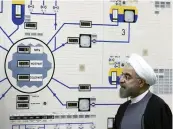  ?? AP ?? In this Jan. 13, 2015, photo Iran’s former President Hassan Rouhani visits the Bushehr nuclear plant.