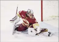  ?? Richard T Gagnon / Getty Images ?? Boston College goalie Spencer Knight, a Darien native, was named one of 10 finalists for the Hobey Baker Award on Wednesday.