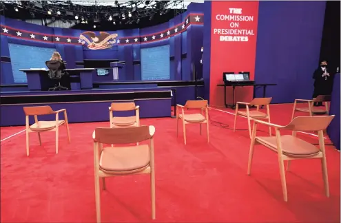  ?? Julio Cortez / Associated Press ?? Chairs are seen in social distance spacing ahead of the first presidenti­al debate between President Donald Trump and former Vice President Joe Biden at the Health Education Campus of Case Western Reserve University on Tuesday in Cleveland.