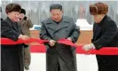  ?? Photograph: STR/ AFP via Getty Images ?? Kim Jong-un cuts the ribbon to mark the completion of Samjiyon.