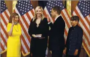  ?? PATRICK SEMANSKY — STAFF PHOTOGRAPH­ER ?? House Speaker Nancy Pelosi, left, conducts a ceremonial swearing-in for Rep. Mike Garcia on Tuesday.