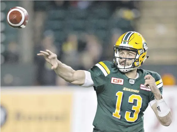  ?? JASON FRANSON/THE CANADIAN PRESS/FILES ?? Quarterbac­k Mike Reilly is on pace for 6,000 passing yards this year, which would be an Eskimos record.