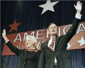  ?? SCOTT APPLEWHITE — THE ASSOCIATED PRESS FILE ?? In this file photo, President-elect George H.W. Bush and his wife Barbara wave to supporters in Houston, Texas after winning the presidenti­al election. Bush has died at age 94. Family spokesman Jim McGrath says Bush died shortly after 10 p.m. Friday about eight months after the death of his wife, Barbara Bush.