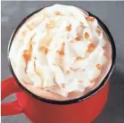  ??  ?? Starbucks launched its Toffee Almondmilk Hot Chocolate on Tuesday. Dairy- and gluten-free foods and drinks are appearing on more and more fast-food chains’ menus. STARBUCKS