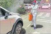  ?? HT PHOTO ?? Bhavani Bhushan sanitising his vehicle.