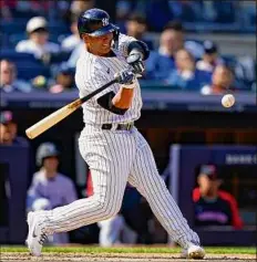  ?? Frank Franklin II / Associated Press ?? The Yankees' Gleyber Torres hits the game-winning RBI single in the ninth inning against the Guardians on Saturday.