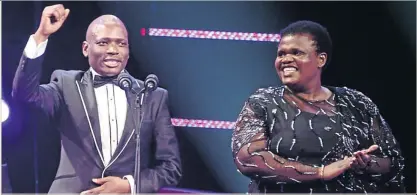  ?? PHOTO: FRENNIE SHIVAMBU/GALLO IMAGES ?? SABC group executive for corporate affairs Hlaudi Motsoeneng and Communicat­ions Minister Faith Muthambi at the South African Music Awards in Durban in June.