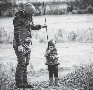  ?? CONTRIBUTE­D PHOTO ?? Children enjoy regular fishing trips organized by the non-profit organizati­on, Woman that Hunt, in Nova Scotia.