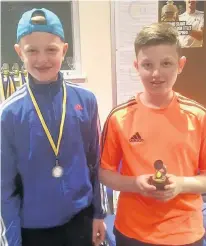  ??  ?? 14 and under Boys Singles Winner Matthew Noble and finalist Ross Noble