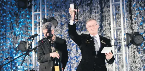  ?? PHOTOS: JAYMAN BUILT ?? Jayman Built chairman and CEO Jay Westman toasts the opening of the Village Centre, which took about 14 months to build.