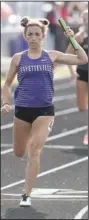  ?? ( NWA Democrat- Gazette/ J. T. Wampler) ?? Fayettevil­le senior Kessiah Bemis crosses the finish line in the 4x200- meter relay at the 6A-West Conference track and field meet Wednesday in Fayettevil­le.