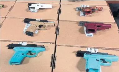  ?? PETER GOFFIN/THE CANADIAN PRESS ?? Seized firearms displayed during a Toronto Police Service press conference in June. “If we really want fewer handguns on our streets and a safer Canada, we have to stop this insanity of criminaliz­ing drugs,” Reid Rusonik writes.