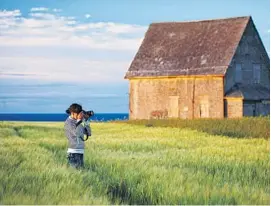  ?? Photo by Yvonne Duivenvoor­den ?? Capturing the sights of Prince Edward Island