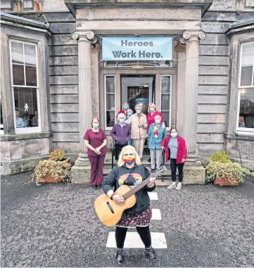  ??  ?? ON THE ROAD: Callum Campbell and Malcolm Swan of Longstay performed at Balhousie North Inch Care Home in Perth last year while Katie Whittaker was at Viewlands House.