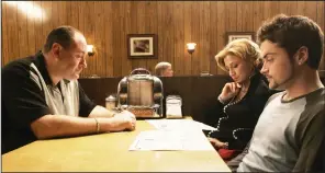  ?? ?? Last Rites: James Gandolfini as Tony Soprano, Edie Falco as Carmela Soprano and Robert Iler as Anthony Junior in “The Sopranos”