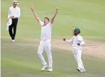  ?? – Reuters ?? CAREER BEST FIGURES: South Africa’s Morne Morkel celebrates taking one of his five wickets during the fourth day of their third Test against Australia in Cape Town on Sunday.