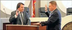  ??  ?? Judge McCracken Poston (left) reads the oath of office Tuesday afternoon, Jan. 2, while swearing in Kelly Bomar as Ringgold’s newest City Council member. (Catoosa News photo/Adam Cook)