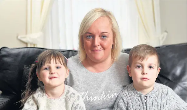 ?? WALES NEWS SERVICE ?? Samantha Dorricott, 44, with her grandchild­ren, three-year-old Chantelle and four-year-old Jenson