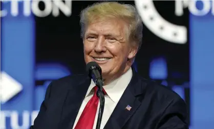  ?? Photograph: Ross D Franklin/AP ?? Donald Trump speaks to supporters at a Turning Point Action gathering in Phoenix, Arizona, in July.