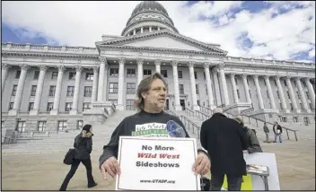  ?? AP ?? Randy Gardner, the older brother of Ronnie Lee Gardner, the last inmate to be killed by firing squad in Utah in 2010, joins a protest earlier this year at the state Capitol in Salt Lake City against capital punishment and a proposal to start using...