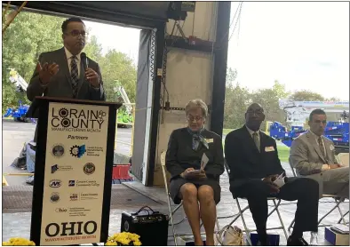  ?? PHOTOS BY KEVIN MARTIN — THE MORNING JOURNAL ?? Lorain County Chamber of Commerce President Tony Gallo speaks at Skylift, Inc. in Lorain on Oct. 7 for the kickoff to Lorain County Manufactur­ing Month. Also pictured: Marcy Kaptur, Sanford Washington Jr., and Max Upton.