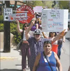  ?? WILL HOOPER / Taos News ?? Rally-goers held signs with various messages of support for a woman’s right to choose.