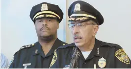  ?? STAFF PHOTO BY ANGELA ROWLINGS, ABOVE; HERALD POOL PHOTO, BELOW ?? CHAOS: Attorney Ruth McLaughlin, below left, and Malik Antonio Koval listen to charges. Falmouth police Chief Edward Dunne, above right, speaks as BPD’s William G. Gross stands near.