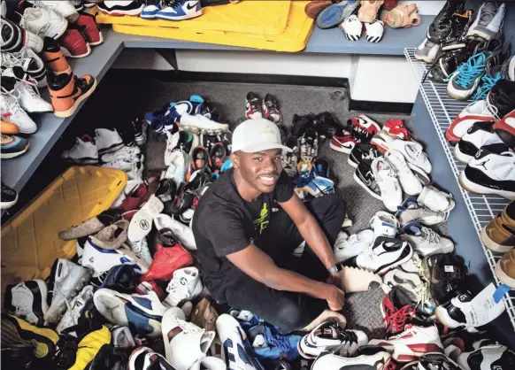  ?? PHOTOS BY ARIEL COBBERT/COMMERCIAL APPEAL ?? Snkrr Bar owner Dominique Worthen inside his sneaker cleaning storefront in Memphis on Oct. 12.