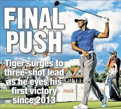  ?? AP ?? LEADING MAN: Tiger Woods tees off on the 16th hole Saturday in the third round of the Tour Championsh­ip in Atlanta. Woods bogeyed the hole, but finished at 12-under with a three-stroke lead heading into the final round.