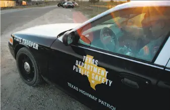  ?? Tony Gutierrez / Associated Press 2008 ?? A Texas trooper patrols in his vehicle in Eldorado, Texas, in 2008. State officials point to thousands of “high threat” arrests in defense of an almost $1 billion mission to secure the border.