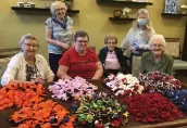  ?? ?? West Park Crossing retirement home’s ‘Snuffle Mat Gang’ with some of their creations (supplied by Donna Fritzke)