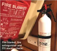  ??  ?? Fire blanket, fire extinguish­er and CO alarm—check!