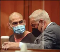  ?? ARIC CRABB — STAFF ARCHIVES ?? Cain Velasquez, left, with his attorney Mark Geragos, during a hearing at the Santa Clara County Hall of Justice on March 7 in San Jose. Velasquez allegedly shot at a car carrying a man charged with molesting his minor relative, wounding the man's stepfather.