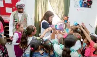  ??  ?? Kalimat Foundation distribute­s gifts to kids at the Emirati-Jordanian camp in Mrajeed Al Fhood region, Jordan. — Supplied photo
