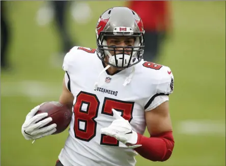  ?? MATT LUDTKE - THE ASSOCIATED PRESS ?? Tampa Bay Buccaneers’ Rob Gronkowski warms up before the NFC championsh­ip NFL football game between the Tampa Bay Buccaneers and Green Bay Packers in Green Bay, Wis., Sunday, Jan. 24, 2021.