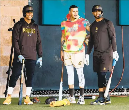  ?? MEG MCLAUGHLIN U-T ?? Left to right, Juan Soto, Manny Machado and Xander Bogaerts bring big-time star power to Padres workouts this spring training.